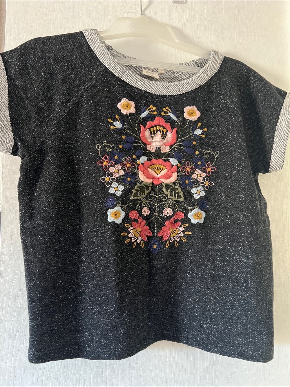 White Crow Black Short-Sleeve Top with Pink Floral Embroidery